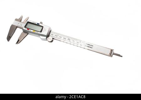 A digital caliper on a white background. Measuring equipment. Stock Photo