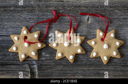 Christmas cookies on green wood Stock Photo