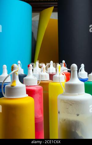 Colorful palette of acrylic paint tubes at artist studio. Choosing different color of paint for his artwork. Creativity and education concept Stock Photo