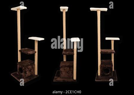 Cat house isolated on black background. Different angles of cat tree. Pet scratch tower stand. Nobody. Stock Photo