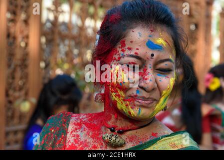 Young Indian people celebration Holi festival in India. Stock Photo