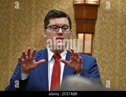 Topeka, Kansas, USA, February 16, 2019  Kansas State Treasurer Jake LaTurner talks with members of the 2nd congressional district during a meeting at the annual GOP convention Stock Photo