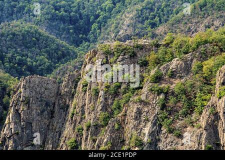 View from Witches Dance Floor onto Rosstrappe. The Rosstrappe is a 403m high (1,322 ft) granite crag in the Harz mountains Germany. Stock Photo