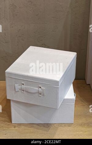 Wooden boxes with closed lid stacked and isolated on white background ...