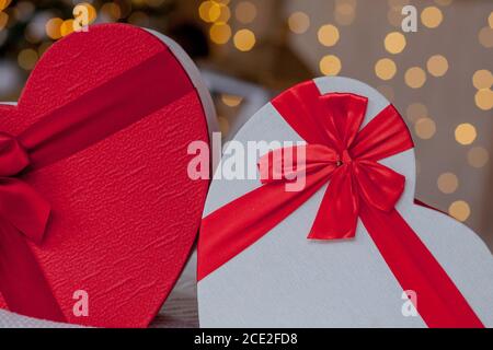 Close up of gift boxes in heart shaped. Heart shaped gift boxes on Valentine's day . Stock Photo