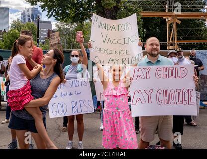 August 30, 2020, Boston, Massachusetts, USA:Protesters rally during anti flu shot mandate rally in Boston. Hundreds of the anti flu shot protesters rally against Massachusetts flu vaccine mandate outside of the Statehouse on August 30, 2020. Massachusetts public health officials announced on August 19 that influenza immunization were now required for all students over 6 months old at pre-school, K-12, and colleges unless either a medical or religious exemption is provided. Students will be expected to have received a flu vaccine by December 31, 2020, for the 2020-2021 flu season. (Photo by Ke Stock Photo