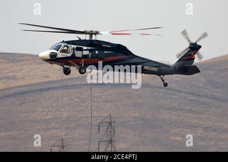 Sikorsky UH-60A Black Hawk N805PJ operating out of Meadowlark Field in Livermore, California, in response to the 2020 SCU Lightning Complex fires.  N8 Stock Photo