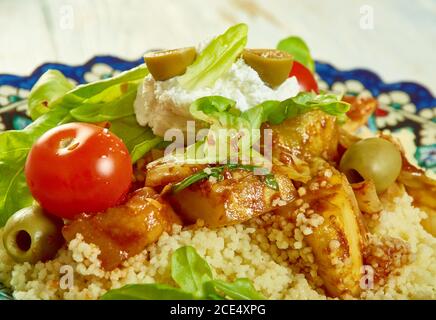 Harissa veg, goat's cheese and couscous salad Stock Photo