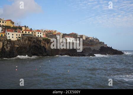 View of Câmara de Lobos seascape from the harbour, in Madeira Stock Photo