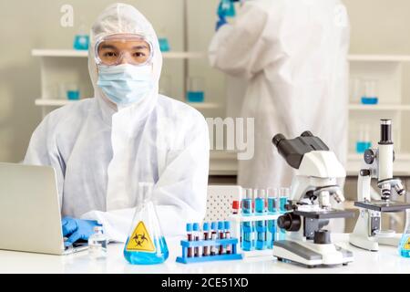 Scientists working in lab Stock Photo