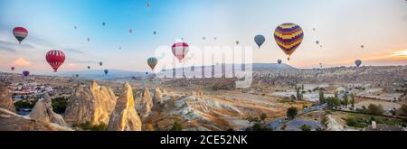 Hot air balloon flying at sunrise time Stock Photo