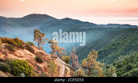 Sunset views in Santa Cruz mountains; Smoke from the nearby burning wildfires, visible in the air and covering the mountain ridges and valleys; South Stock Photo