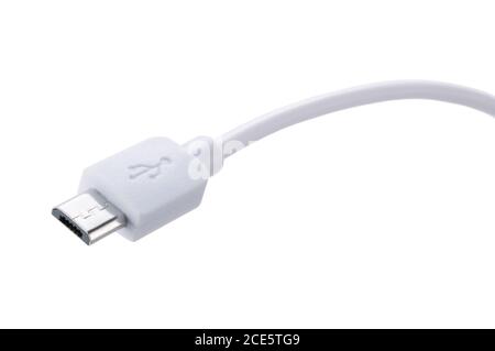 Shooting a micro USB placed on a blue background from an angle Stock Photo