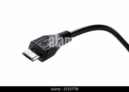 Shooting a micro USB placed on a blue background from an angle Stock Photo