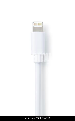 Shooting a lightning cable placed on a blue background from an overhead view Stock Photo