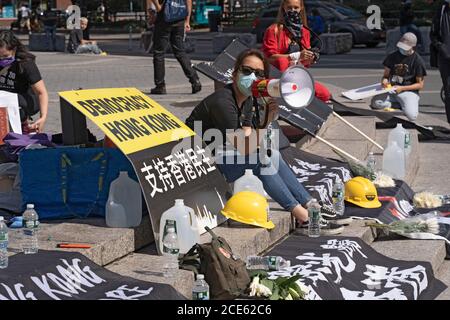 NEW YORK, NY – AUGUST 30, 2020: Pro-democracy in Hong Kong protest on the eve of the first anniversary of the Prince Edward MTR station incident. Stock Photo