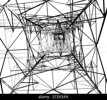 A large electricity power mast seen in silhouette Stock Photo