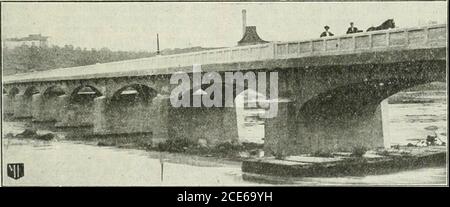 Water sewage works . WORKERS INTHE FIELD m Rapid Concrete Bridge