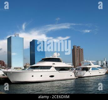 -- anchored along the waterfront of Kaohsiung harbor in Taiwan Stock Photo