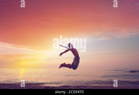 Jumping boy Stock Photo