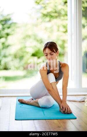 Attractive girl practicing Yoga Stock Photo