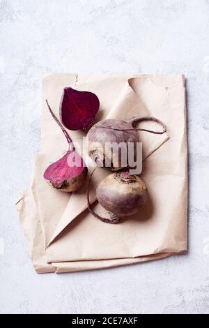 Fresh whole and sliced beetroot viewed from above Stock Photo