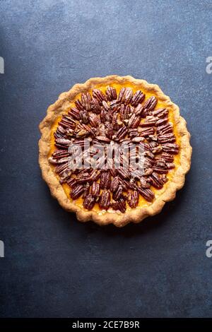 Overhead image of pecan pumpkin pie Stock Photo