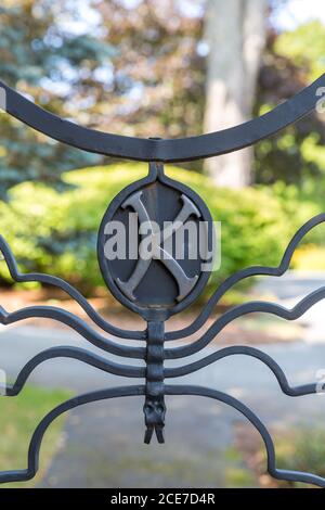 Caption Bangor, USA - 27th August 2014: Detail of the gate of the house of Stephen King, in Bangor, Maine, USA. Stephen King is famous as an author of Stock Photo