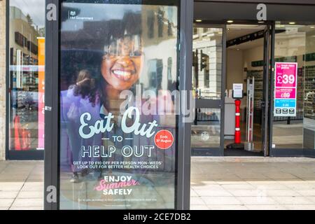 UXBRIDGE, LONDON/ENGLAND- 29 August 2020: Eat out to help out billboard in Uxbridge town centre Stock Photo