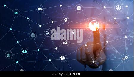Information Communication Technology. Female Pushing Button On Virtual Screen With Digital Icons Stock Photo