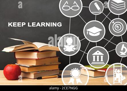 Books Lying On Desk, Educational Collage Over Black Background Stock Photo