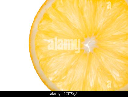 Perfectly retouched sliced half of lemon fruit isolated. Top view of textured ripe slice of lemon citrus fruit Stock Photo