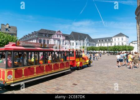 Trier, RP / Germany - 29 July 2020: tourist sightseeing train in front of the cathedral in Trier in the Mosel region Stock Photo