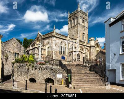 Sun shines on the traditional gothic parish church of St John The Baptist in the English town of Axbridge. Stock Photo