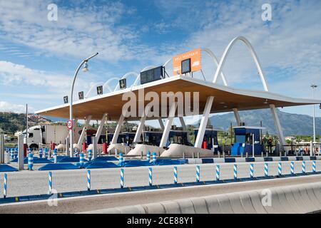 Futuristic exterior of toll road with contemporary payment system on background of blue sky Stock Photo