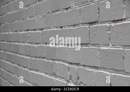 Old whitegrunge brick wall background in perspective Stock Photo