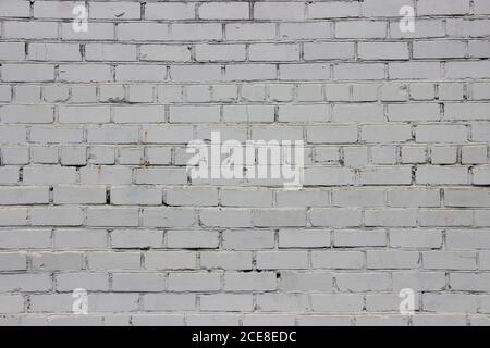 White painted grunge brick wall background texture Stock Photo
