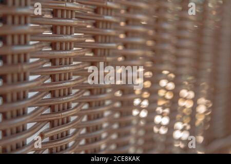 Old wicker plastic chair texture. Stock Photo