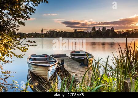 Late summer sunrise on one of the lakes at Cotswold Water Park. Stock Photo