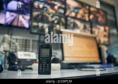 Walkie-talkie placed on an office desk in a control room Stock Photo