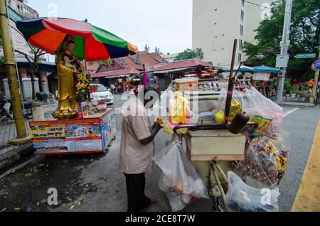 Georgetown, Penang/Malaysia - Jul 02 2016: Benggali bread seller at the street of Jalan Masjid Kapitan Keling. Stock Photo