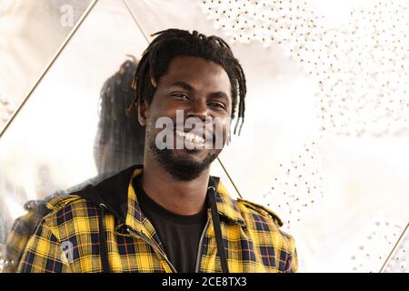 Portrait of a smiling young african man, lifestyle concept Stock Photo