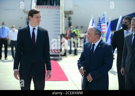 Lod, Israel . 31st August, 2020. Israel's chief of National Security Council Meir Ben Shabbat (R) and Senior U.S. Presidential Advisor Jared Kushner are seen together before their departure to United Arab Emirates (UAE) at Ben Gurion International Airport near central Israeli city of Tel Aviv on Aug. 31, 2020. An Israeli delegation, joined by senior U.S. officials, departed from Tel Aviv on Monday to Abu Dhabi in Israel's first commercial flight to the United Arab Emirates. Credit: Xinhua/Alamy Live News Stock Photo