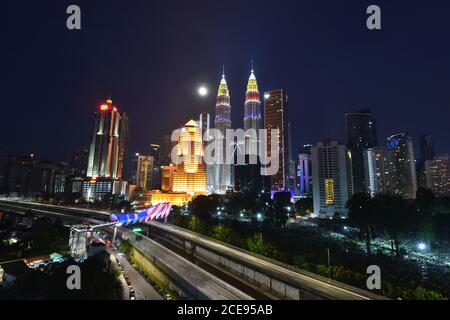 Kuala Lumpur, Malaysia. 31st Aug, 2020. The Petronas Twin Towers are lighted up in the colors of Malaysia's national flag in celebration of the country's Independence Day in Kuala Lumpur, Malaysia, Aug. 31, 2020. Credit: Chong Voon Chung/Xinhua/Alamy Live News Stock Photo