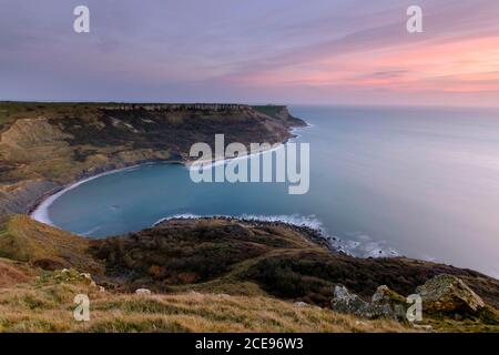 A view over Chapman's Pool from Emmett's Hill at sunset. Stock Photo
