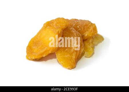 Pile of slices dried peaches isolated on white background. Front views, close-up Stock Photo