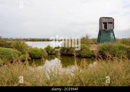 Birdwatchers house at Salinas do Samouco on the Tagus Estuary Natural Reserve, in Alcochete, Portugal. Stock Photo