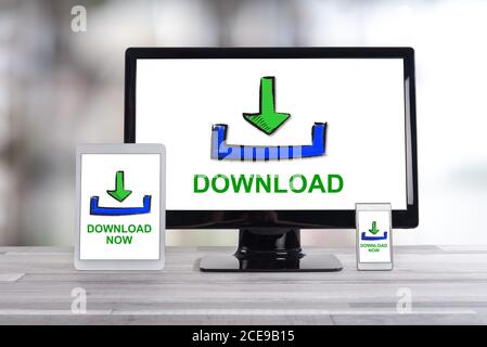 Download concept shown on different information technology devices Stock Photo