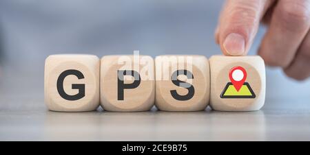 Concept of GPS on wooden blocks Stock Photo