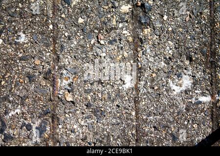 Texture concrete floor with metal bars that were concreted in. Stock Photo